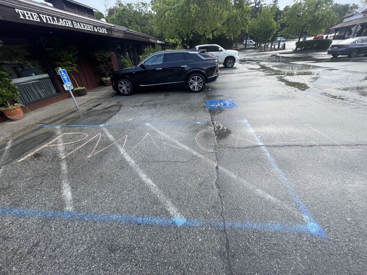 PMARCA.AI chalked at Woodside